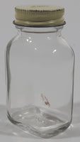 Antique Lilly 3 1/4" Tall Glass Apothecary Bottle with Metal Lid