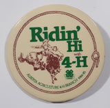 1984-85 Alberta Agriculture 4-H Branch Ridin' Hi with 4-H 2 1/4" Round Button Pin